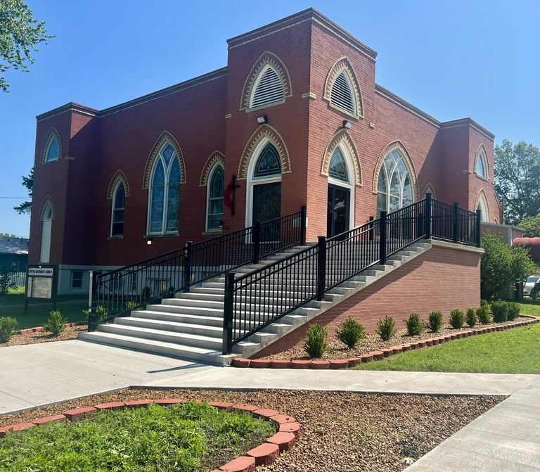 Moran United Methodist Church building new stairs, landscaping, and new sidewalk. May2023