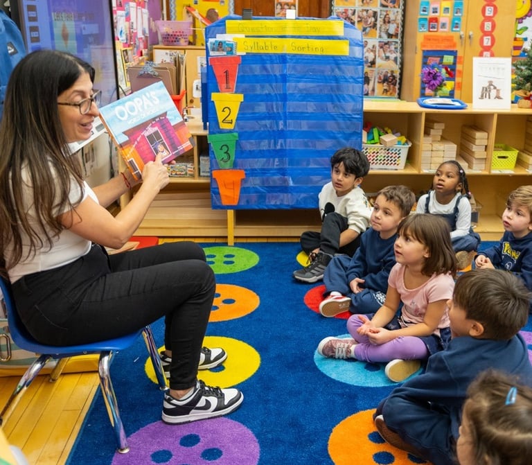 teacher reading oopa book to class