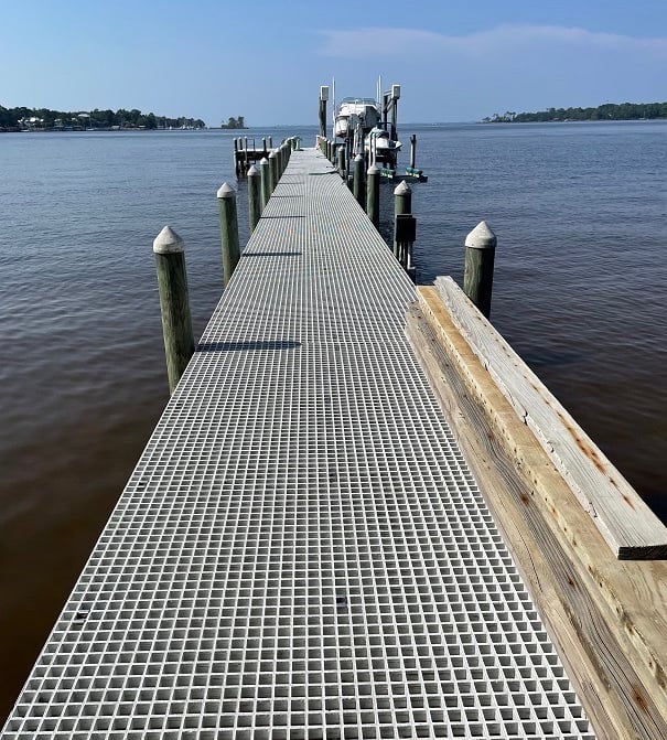 Grate clips being used to secure a boating dock.