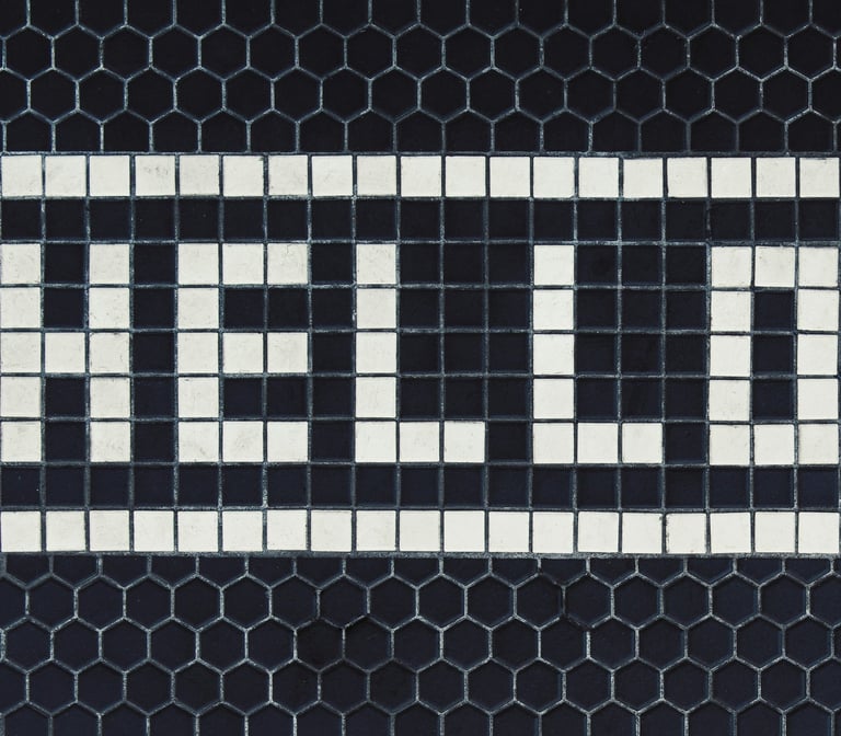 a black and white tile with a white and black checkered pattern