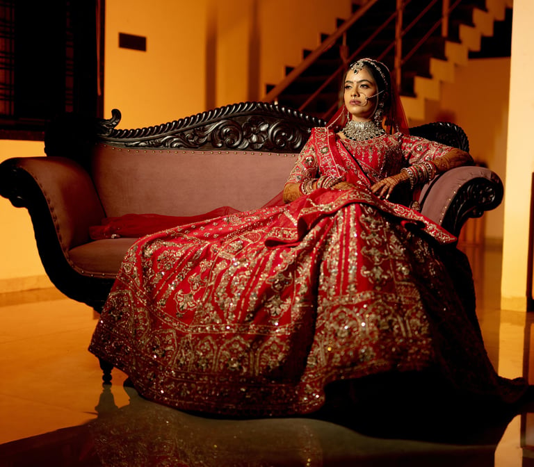 rd-bridal-makeup-vadodara-red-lehenga-bride-solo-portrait-indoor-gujarati-bride