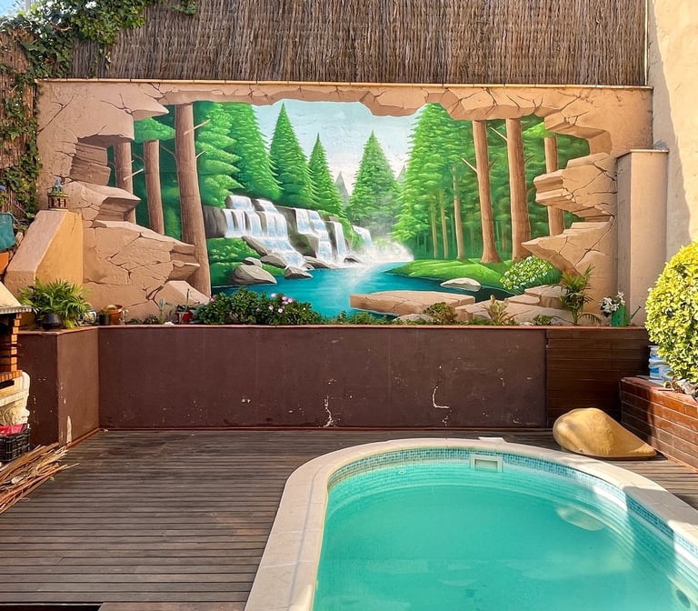 mural de un bosque con unas cascadas en la pared de un jardín particular