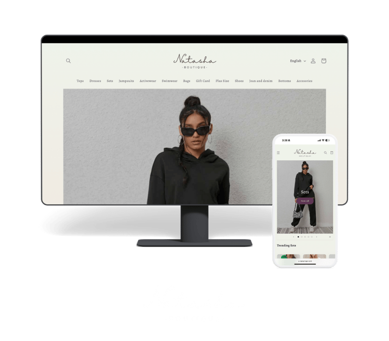 a woman in a black top and sunglasses on a computer screen