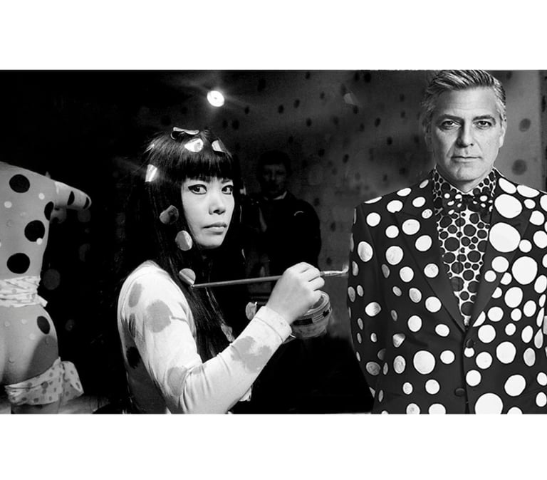 an artist Kusama painting  a man George Clooney in polka dotty dress clothes