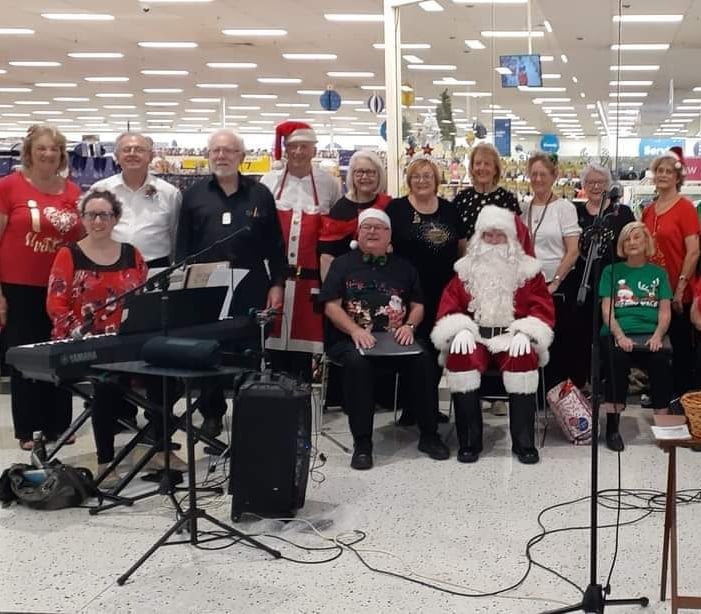 The District Singers perform at Menai Central
