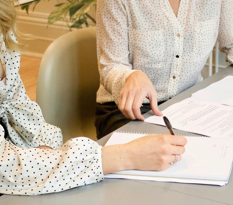 Two women sitting in a consulting and having in conversation in nutritional advice.