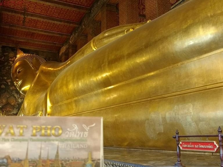 Reclining Buddha statue at Wat Pho temple in Bangkok, a famous cultural landmark