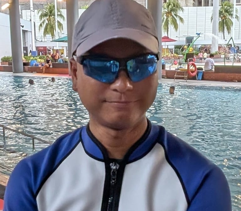 coach justin phua oyougu aquatics