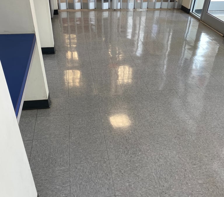 GRAY TILE FLOORS WITH A HIGH POLISH FINISH PENNICLE BUILDING MAINTENANCE