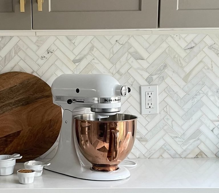 kitchen transformation with herringbone marble backsplash