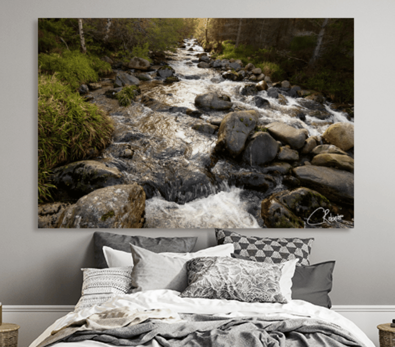 Canvas Print of Autumnal River flowing over rocks