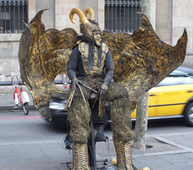 A street artist on Las Ramblas dressed as an alien