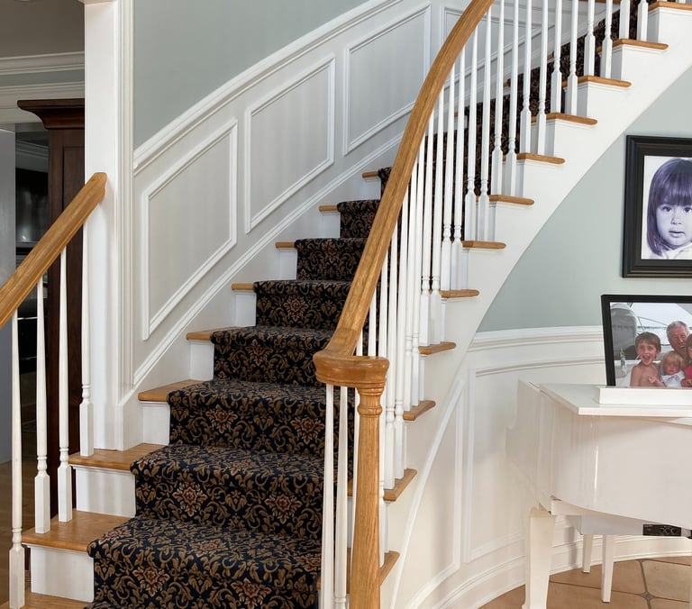 Staircase wainscoting with custom trim panels in Monmouth County NJ