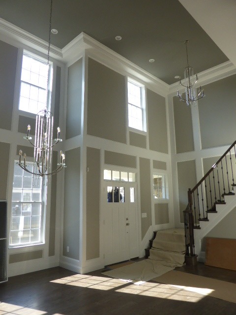 Two-story foyer wainscoting and crown molding installation in Monmouth County NJ