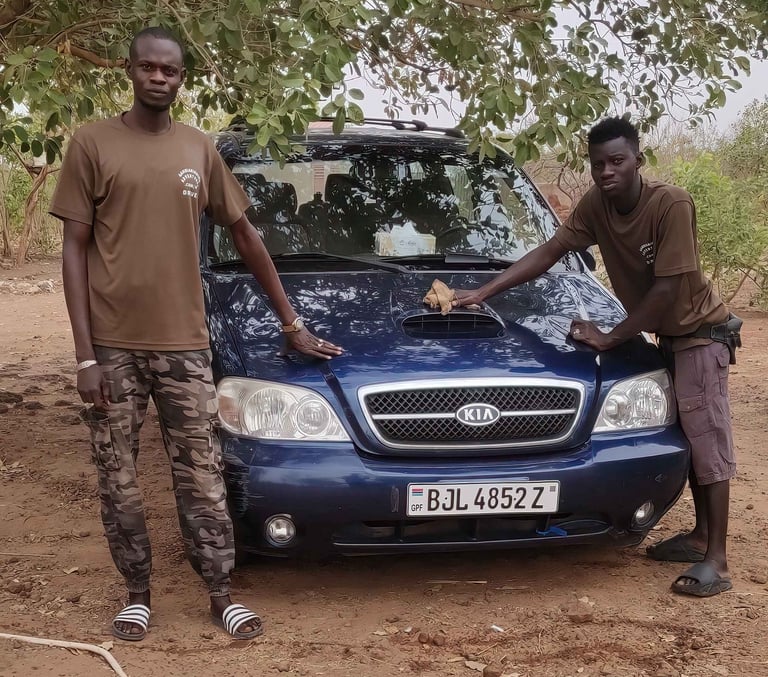Drivers of Birding Adventures Gambia with tour vehicle