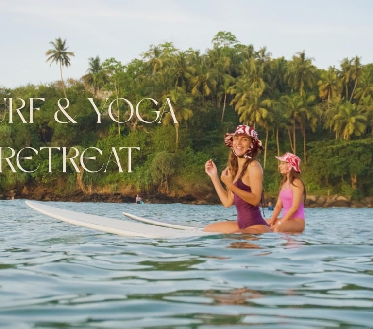 girls sat on surfboards at tropical beach