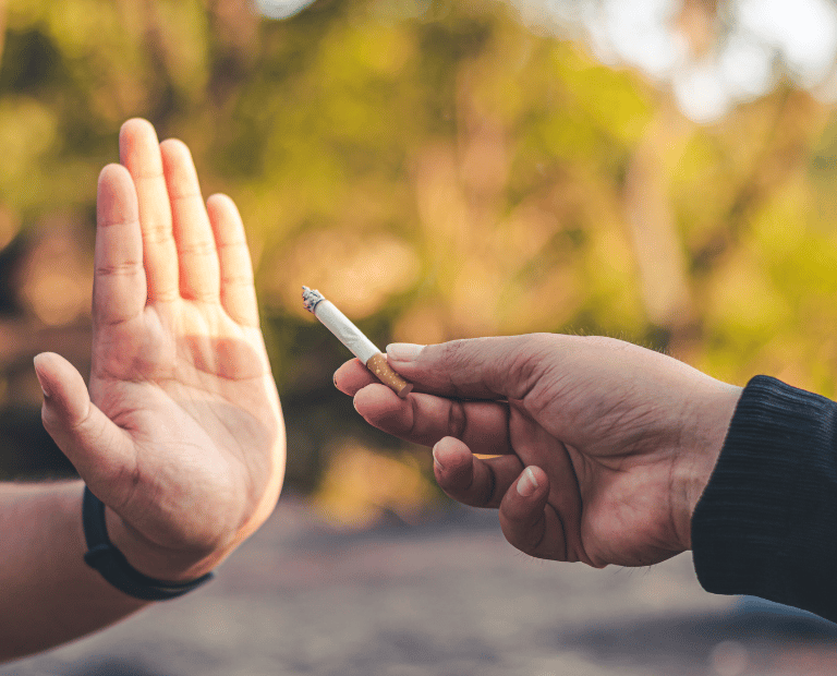 person refusing a cigarette