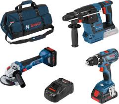 Bosch 18V cordless power tool combo kit including rotary hammer, angle grinder, drill, battery, and bag.