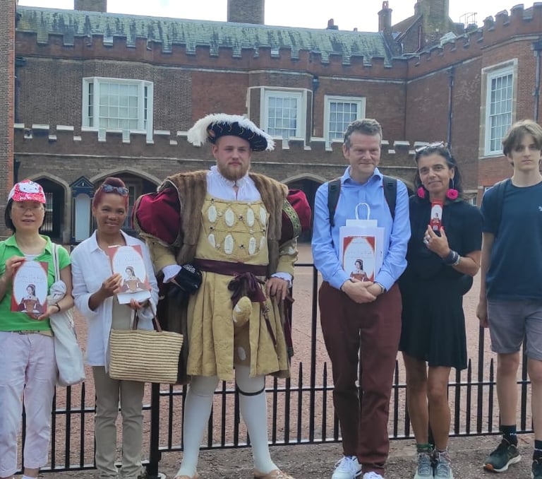 a group of people standing with Henry VIII