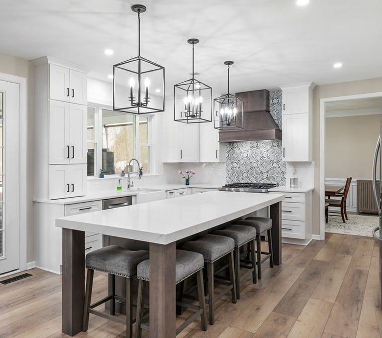 "Custom kitchen renovation with island and tile backsplash in Cumming Georgia"