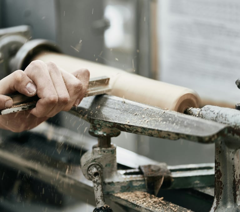 a worker at Vintage nagina handicrafts using new machinery 