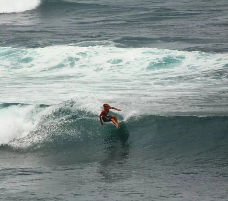surfer at popoyo beach on a wave