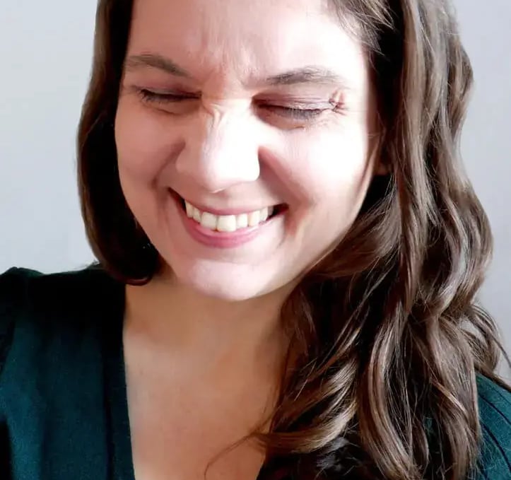 a woman with a smile on her face