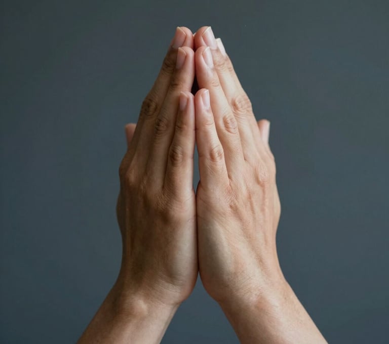 A heartfelt candid photo of hands folded in prayer, captured with artistic depth and soft focus. The skin tones are warm against a deep #1A2F3C background, creating a mood of serenity and devotion. Professional photography style.