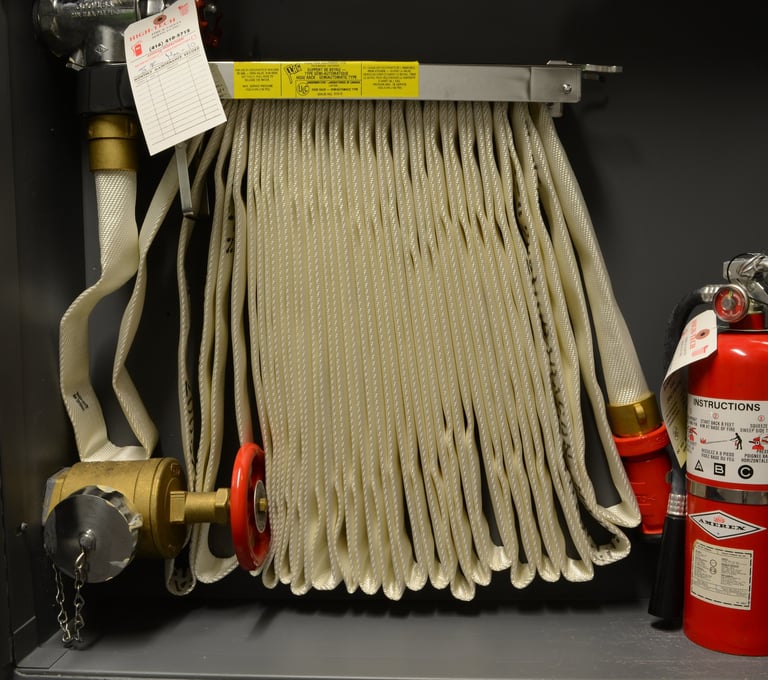 fire hose installed with fire extinguisher