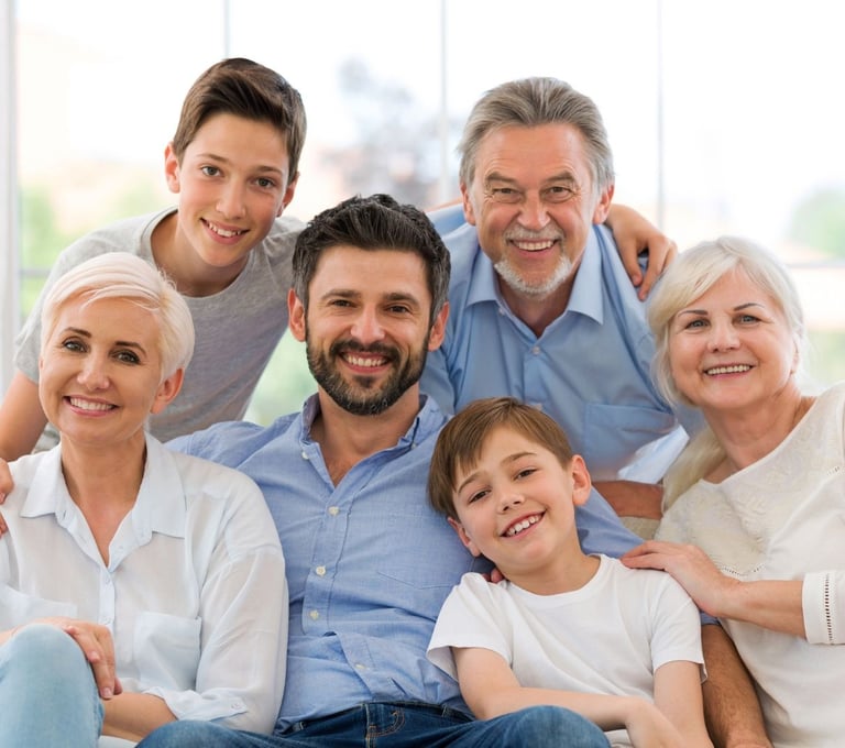 a family of four people sitting on a couch