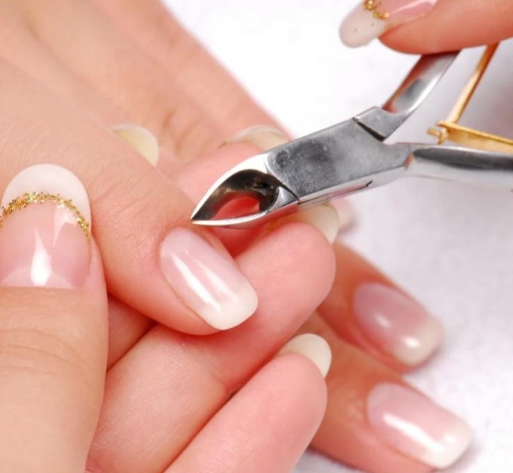 Professional manicure and pedicure treatment for clean, polished, and well-groomed nails in a spa