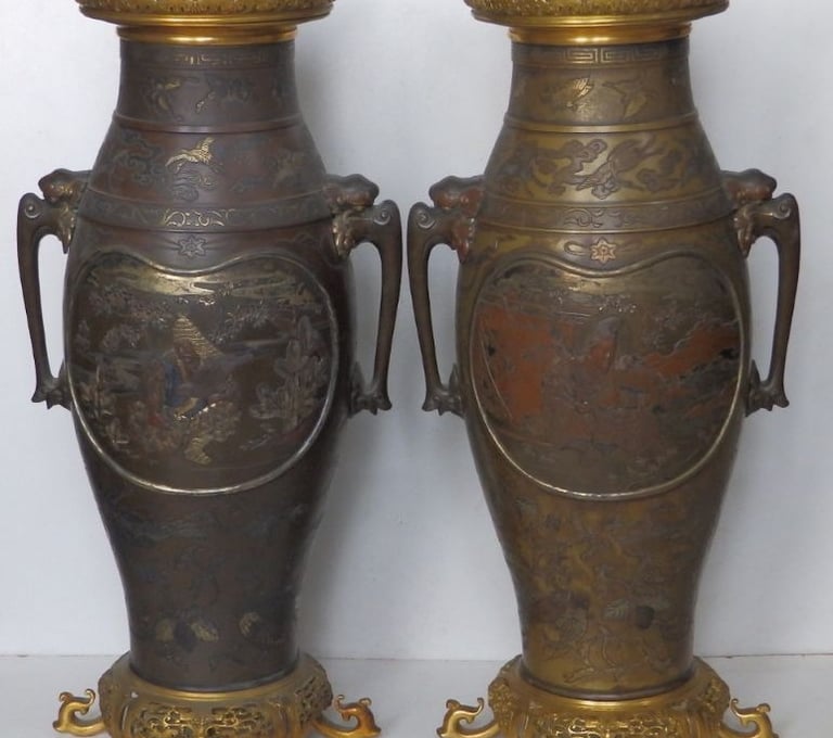 Japanese bronze vases with gold decoration by Eisuke
