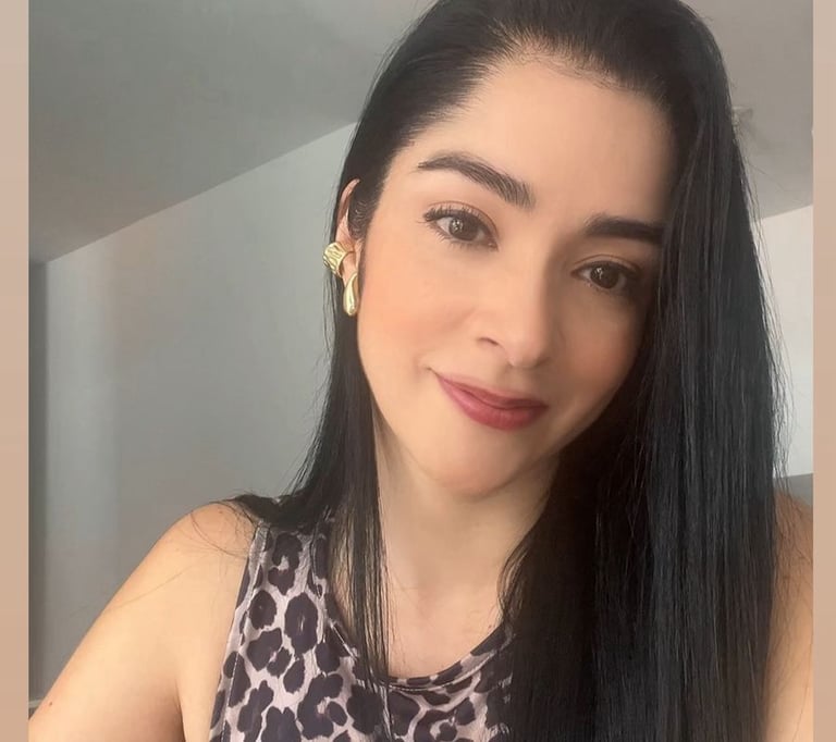 Professional psychologist smiling for a photo in formal wear