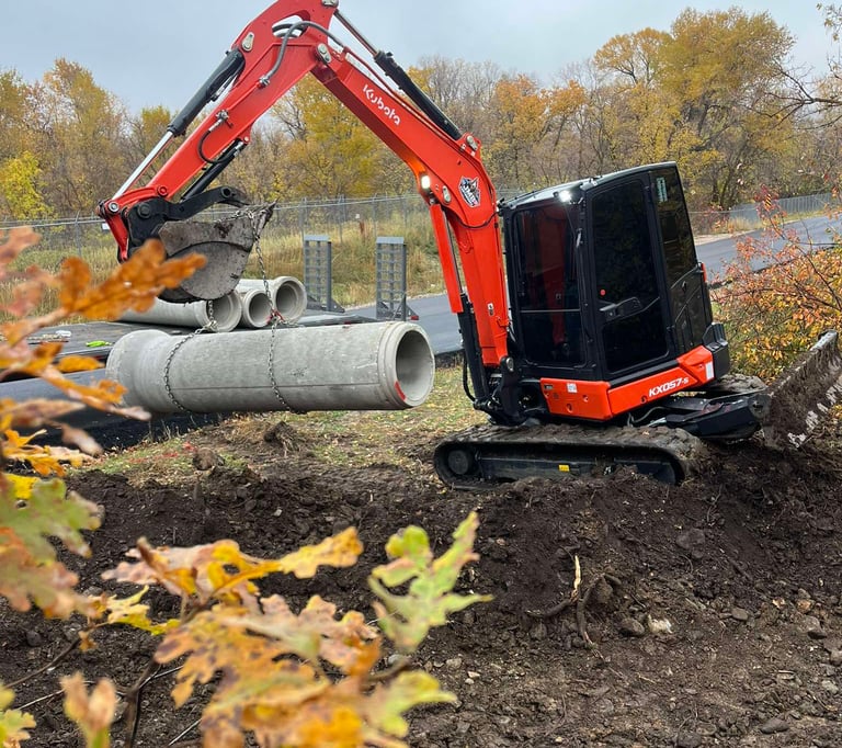 Kubota KX057-s excavating for drainage project