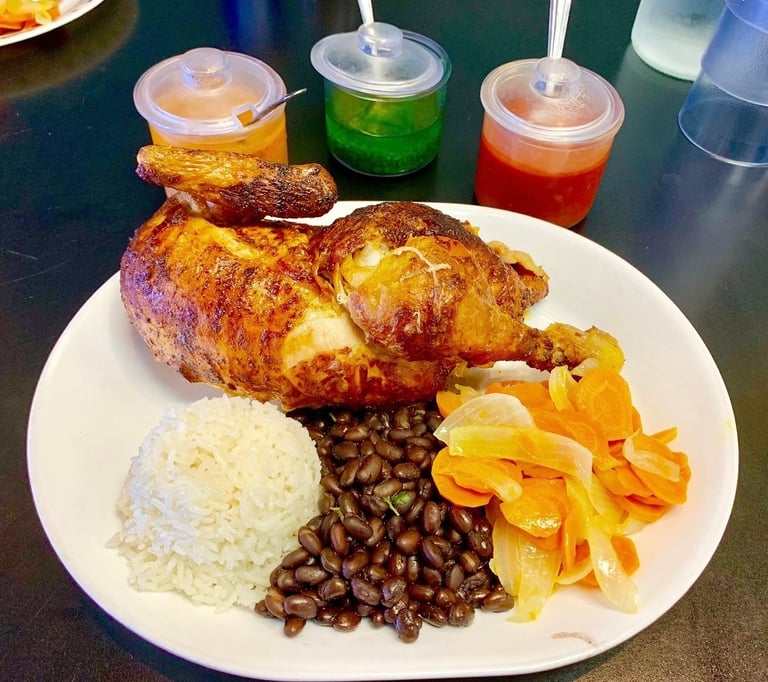 Las Brasas restaurant roast chicken dinner with flavorful sauces