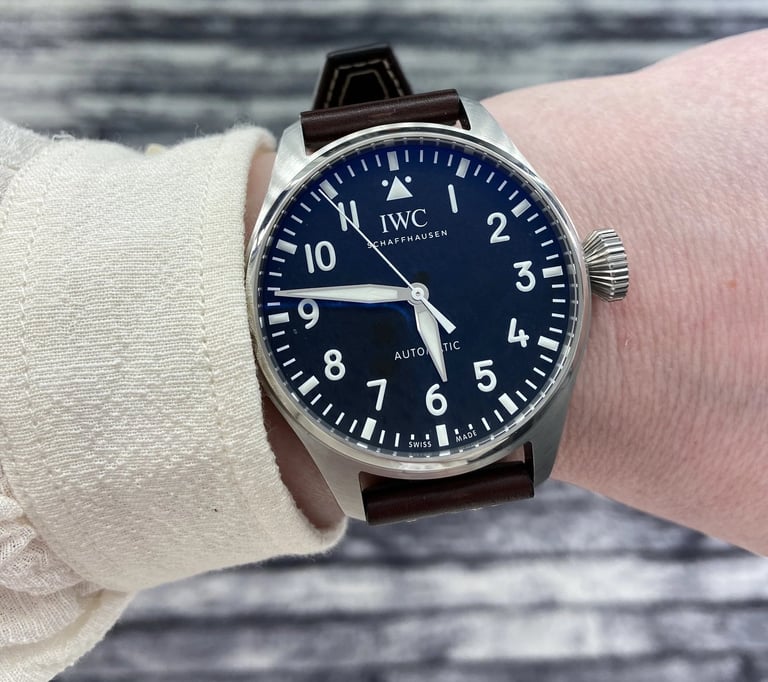 Customer wrist shot of IWC Big Pilot’s Watch with black dial and brown leather strap