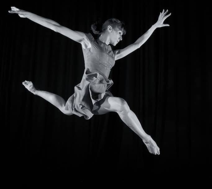 3rd stage dancer Sara Mather doing a contemporary stag jump
