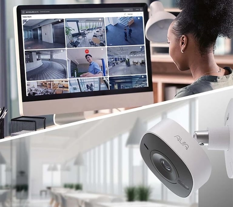 live video feeds from cloud-connected cameras using an advanced surveillance dashboard in a modern office setting.