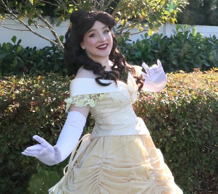 a woman in a beauty and the beast dress 