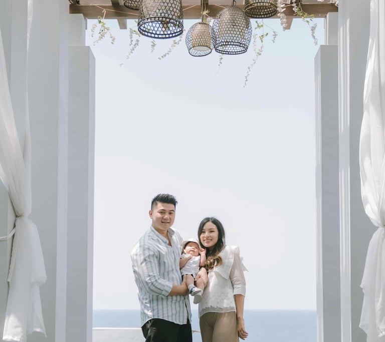 family photography session at Samabe Bali with ocean view backdrop