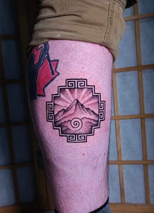 Peruvian Andean cross Tattoo in the leg. Custom piece by Katarsis Tattoo Perú