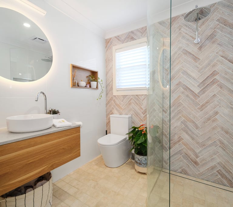 A clean, modern ensuite offering comfort and privacy for guests.