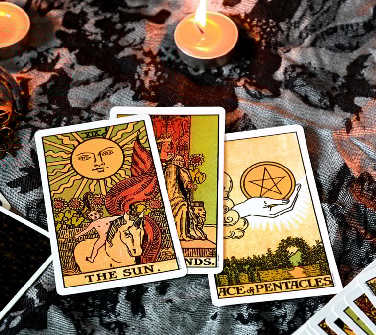 a tarot of tarot cards with candles and candles