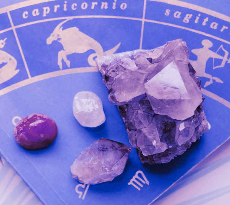 a purple crystal stone with a purple crystal