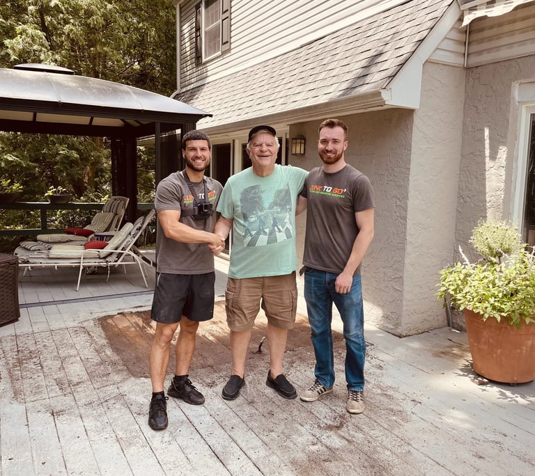 Happy Montgomery County customer with Junk To Go specialists.