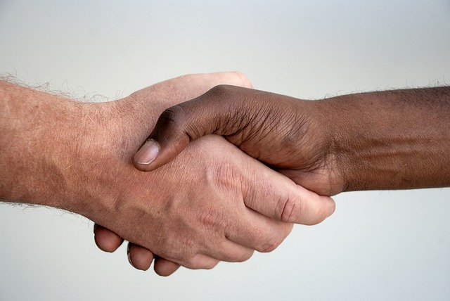 a man and woman shaking hands