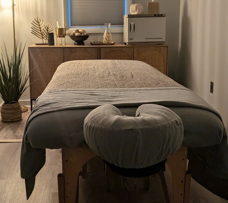 a massage table with a hot towel warmer