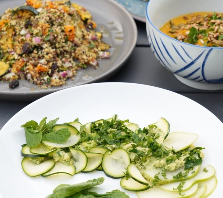 a table with a variety of vegetables