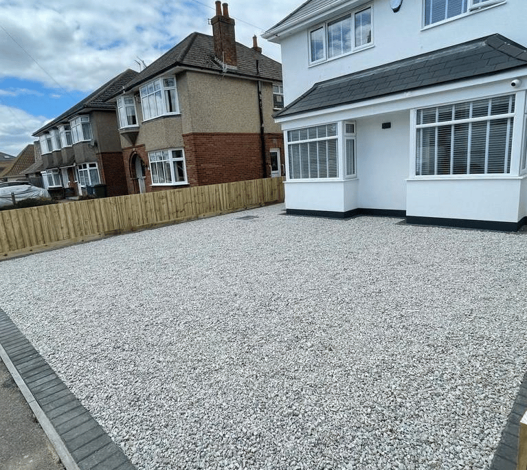 a gravel driveway with gravel driveway and gravel driveway