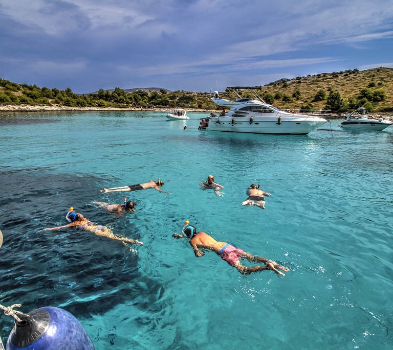 People swimming and snorkling on the Kornati Islands National Park in the Zadar Archipelago.
